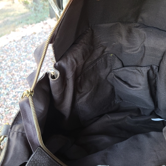 This brown purse is new and never used. It was a gift so there's no tags. - Picture 5 of 7